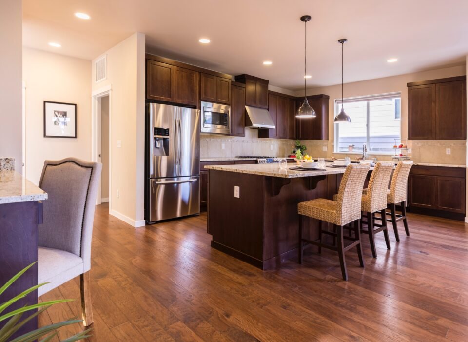 Hardwood floor with fading and scratches in Cypress TX